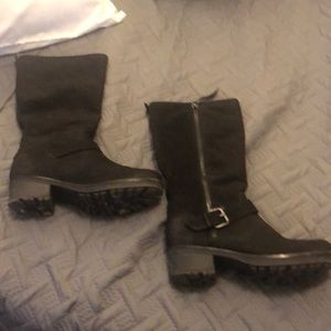 Black boots white mountain